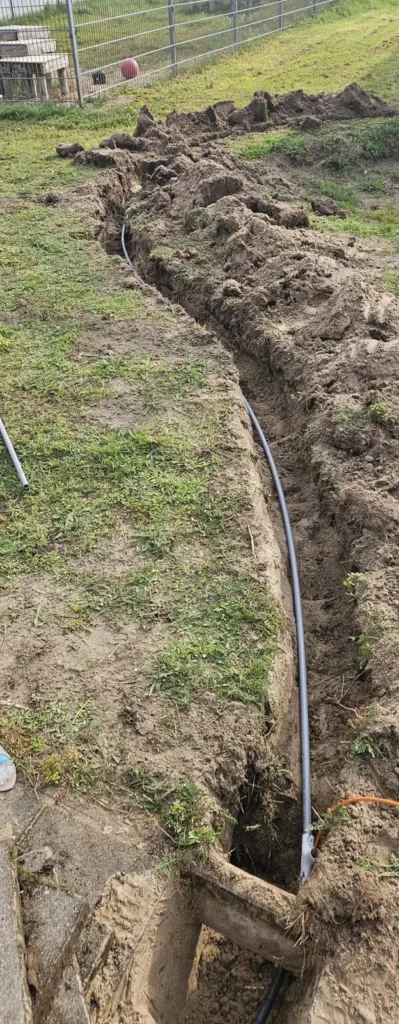 Mantelbuis in de sleuf naar de camerapaal